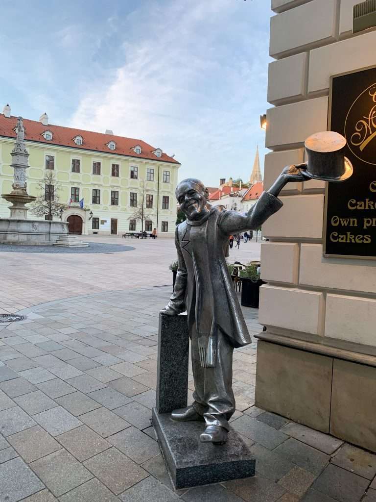 Image shows one of the statues erected in Bratislava and for which the city is famous.