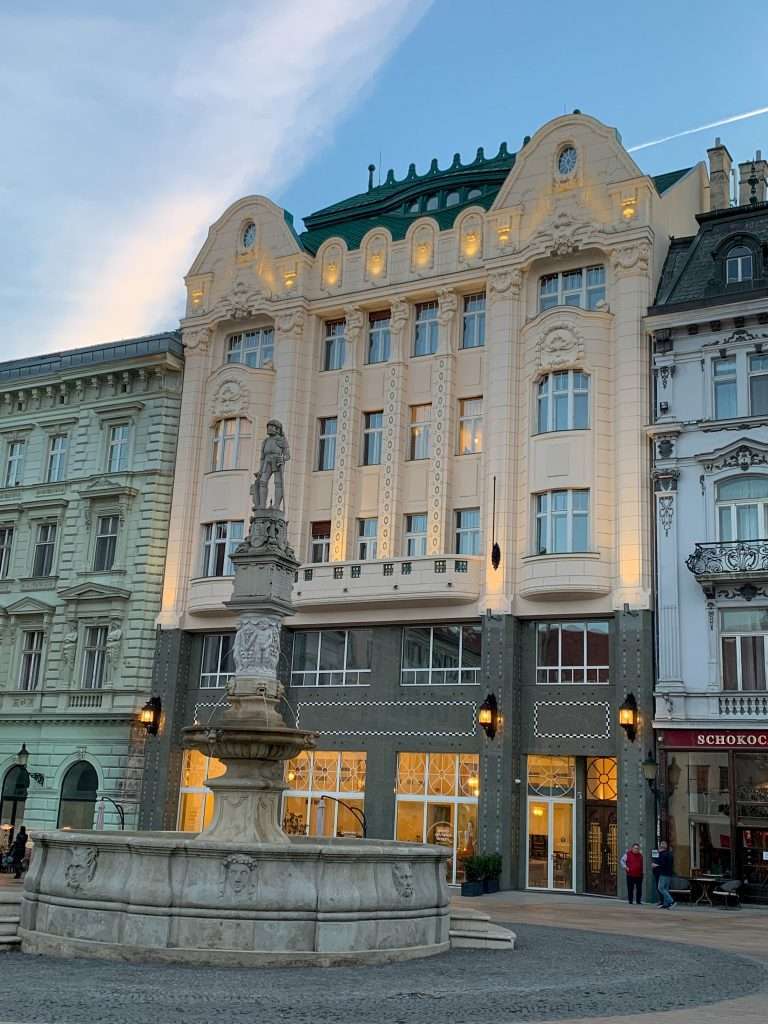 Image shows Roland's Fountain, an historic fountain in Bratislava's Main Square
