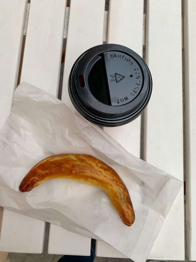 Image shows a coffee and traditional Slovak poppy seed pastry, something to try during 3 days in Bratislava