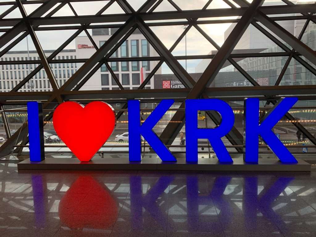 Image shows a I heart KRK sign at Krakow airport