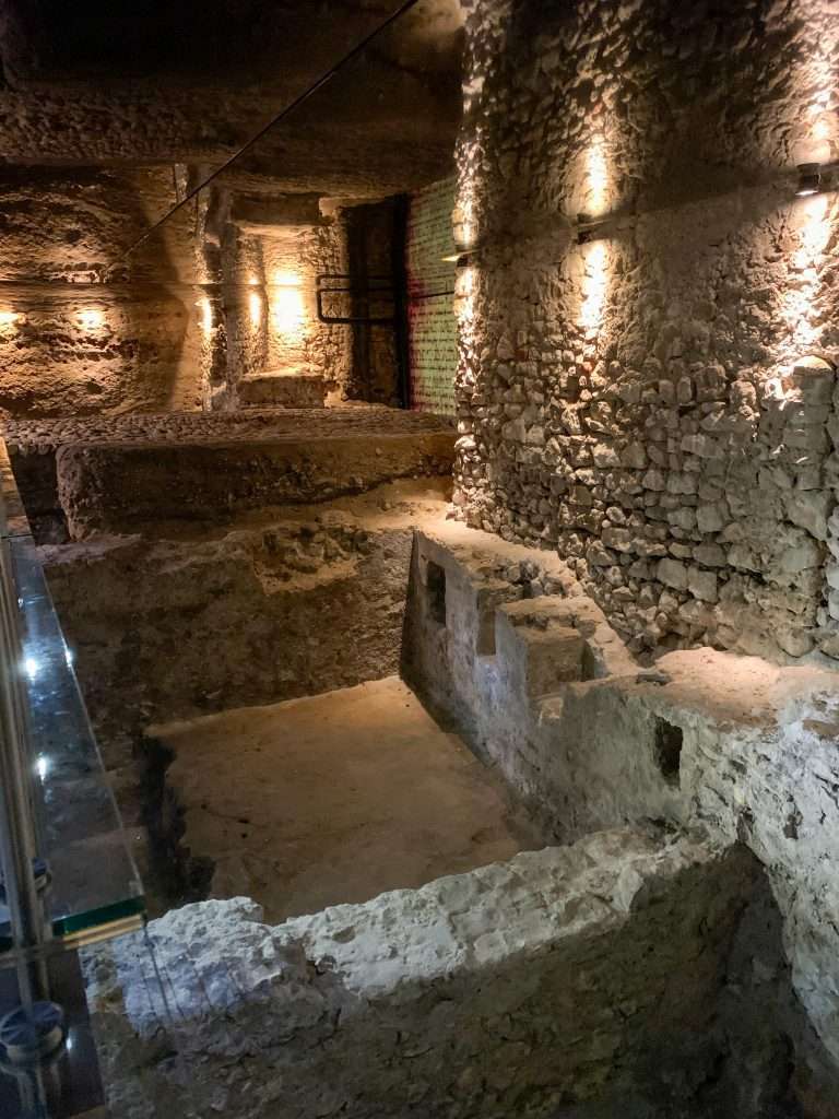 Image shows one of the exhibits in the Rynek underground museum, one of the best things to see in Krakow and a must visit!
