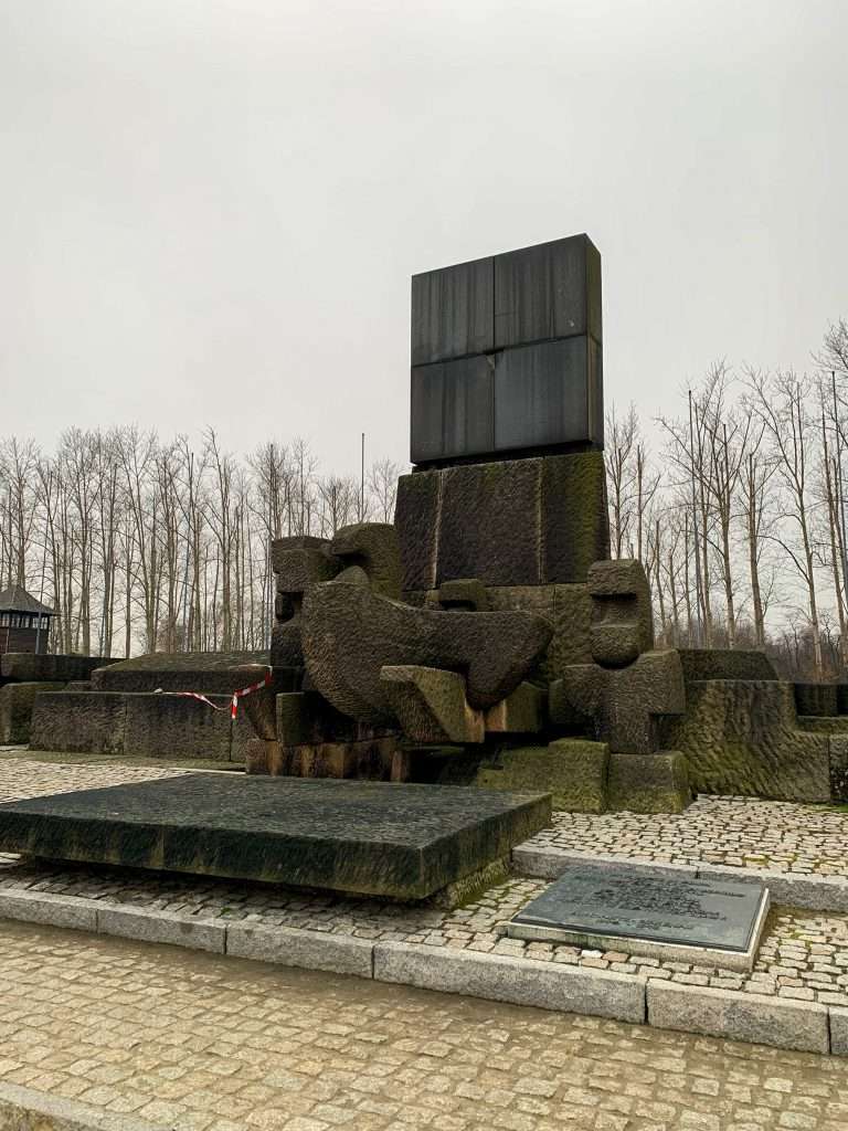 Image shows a memorial to the victims at Auschwitz II