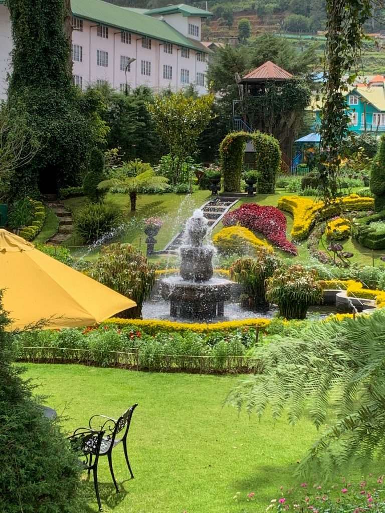Image shows gardens of The Grand Hotel in Nuwara Eliya, one of the best places to visit in Sri Lanka 