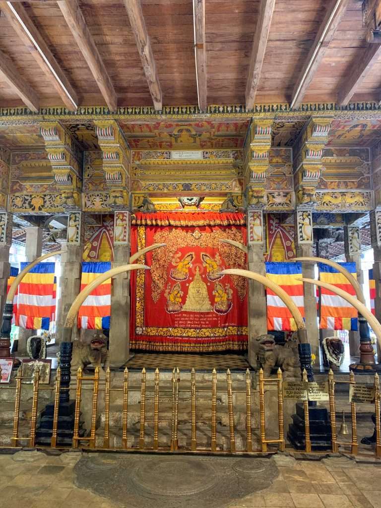 Image shows an inside view of the Temple of the Tooth in Kandy, one of the best thins to see in Sri Lanka 