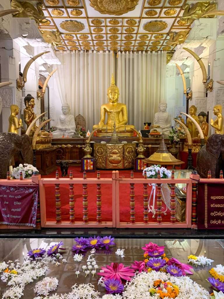Image shows an inside view of the Temple of the Tooth in Kandy, one of the best thins to see in Sri Lanka 