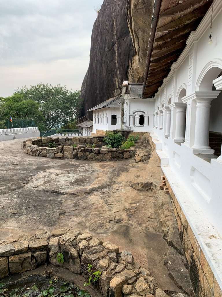 Image shows an outside view at the Dambulla Cave complex, one of the best things to see in Sri Lanka 
