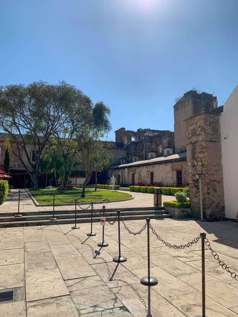 Image shows one of many old or ruined buildings in Antigua Guatemala. Exploring the streets is one of the best things to do during a day in Antigua Guatemala.