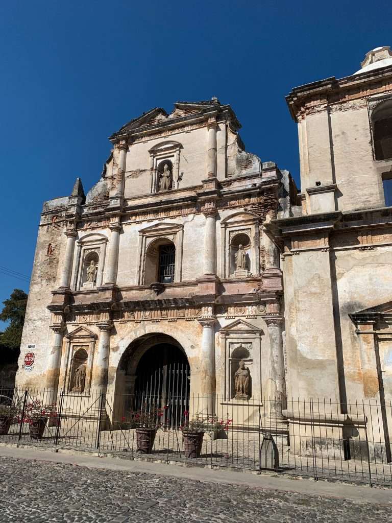 Image shows one of many old or ruined buildings in Antigua Guatemala. Exploring the streets is one of the best things to do during a day in Antigua Guatemala.