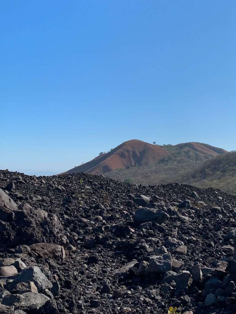 The rough and rocky terrain on Cerro Negro that those who want to volcano board need to climb before boarding down.