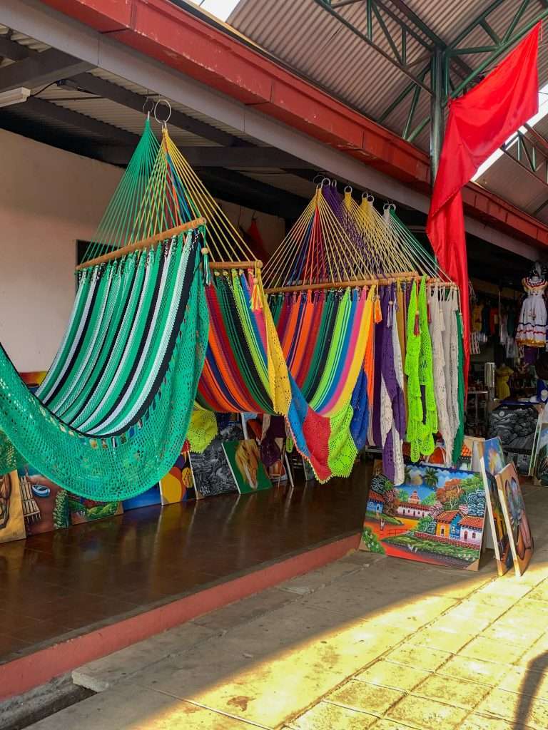 Some of the brightly coloured products, including hammocks, available for sale at the markets in the town of Masaya Nicaragua