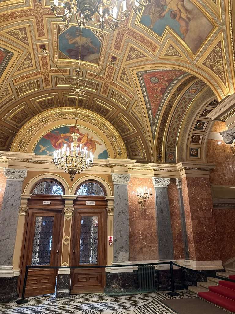 A view of the interior of the Budapest State Opera House with gold dominating the colour palette.
