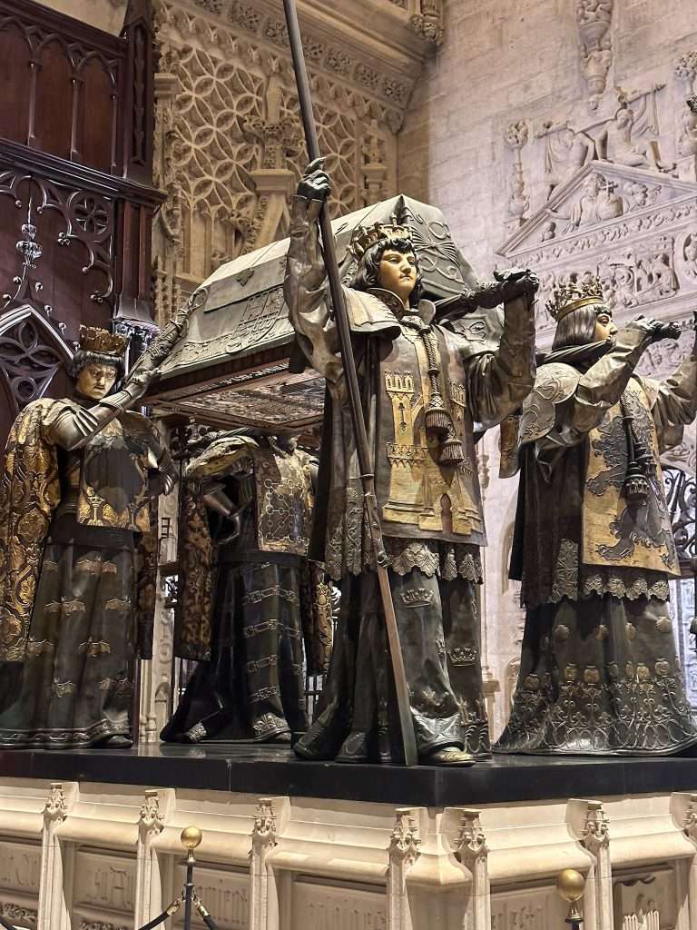 Image shows the tomb of Christopher Columbus within Seville Cathedral 