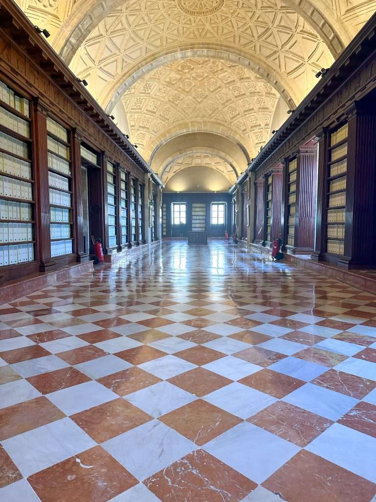 Photo showing the side of the Archive of the Indies, one of the best things to do in Seville. 