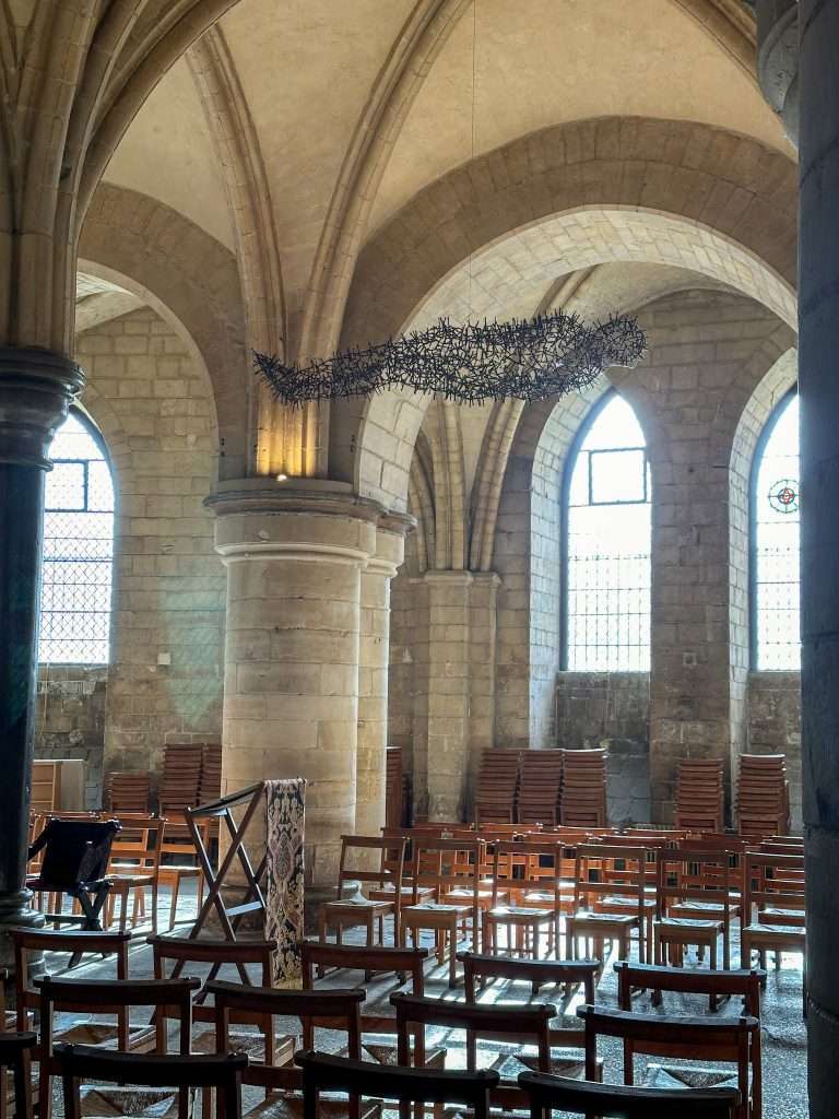A sculpture by Antony Gormley marks the position where the tomb of St Thomas Becket was originally located within Canterbury Cathedral. 
