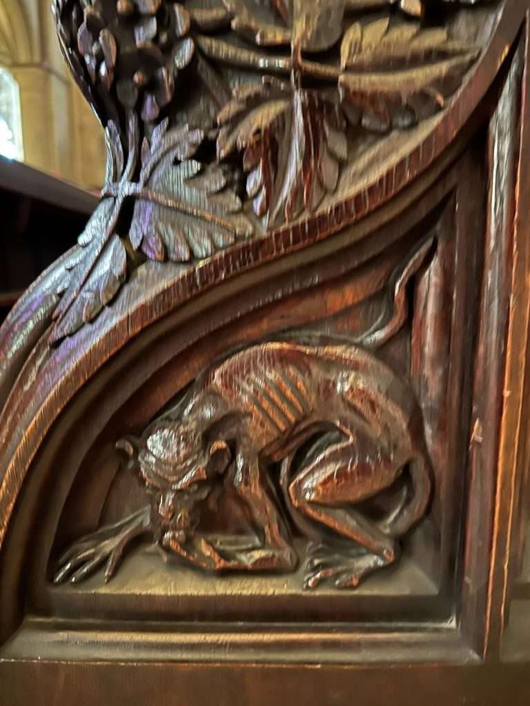 A closer image of some of the carvings within the Quire at Canterbury Cathedral 