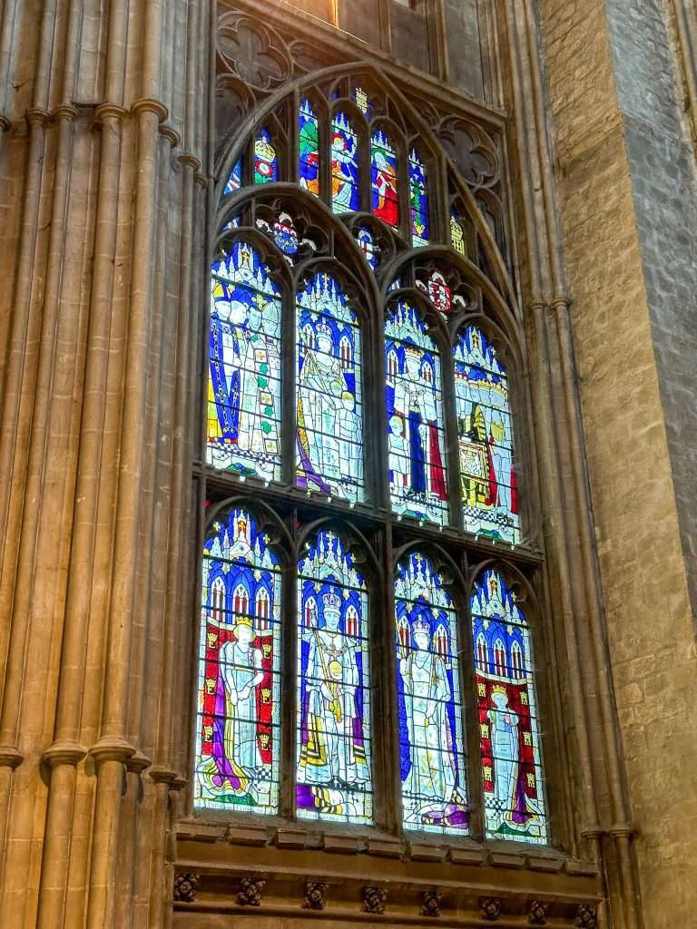 Stained glass windows in Canterbury Cathedral depicting members of the Royal Family including Queen Elizabeth the Second.