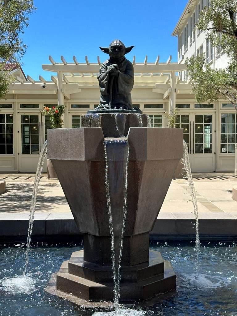 The Yoda Fountain in The Presidio Park in San Francisco so called because a statue of Yoda from the Star Wars movies sits on top of a plinth forming a fountain.