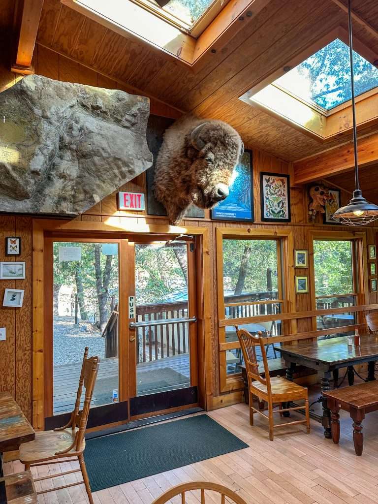 Image shows the inside of the June Bug Cafe at the Yosemite Bug Rustic Mountain Lodge, one of the accommodation options available when spending 2 days in Yosemite.