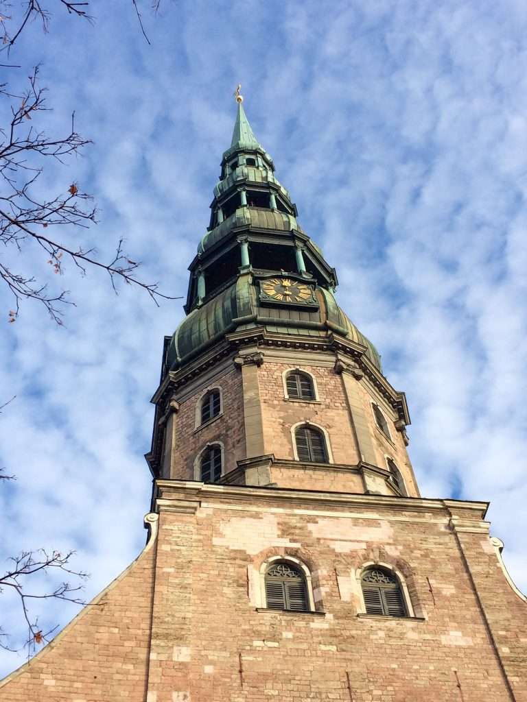 A closer view looking up at the tower of St Peter's Church in Riga.